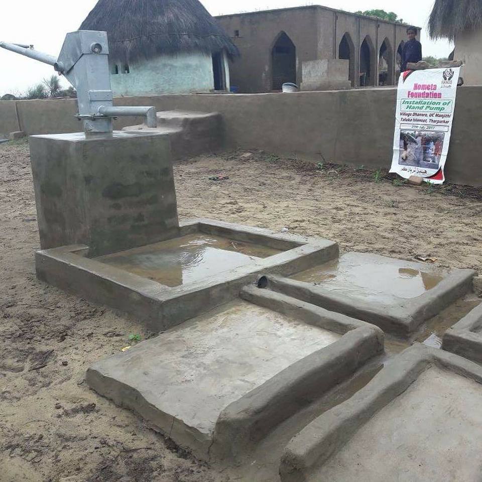 A completed hand pump and water channel in Tharparkar